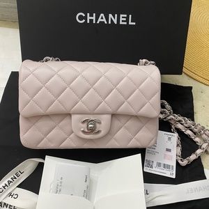 Chanel mini lamskin light pủple Sold